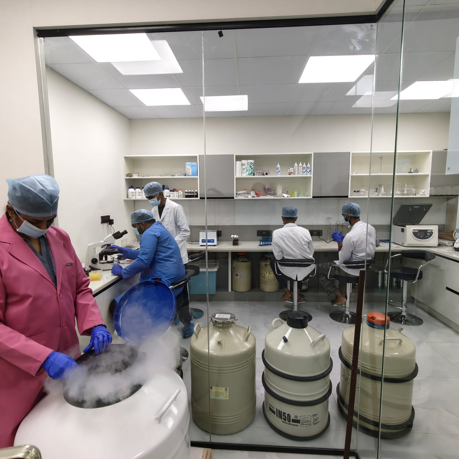 Scientists working with samples
